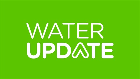 Green tile with white text that says water update.