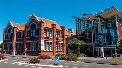 UCOL's Palmy campus is housed in a heritage brick building and a modern glass-fronted extension.