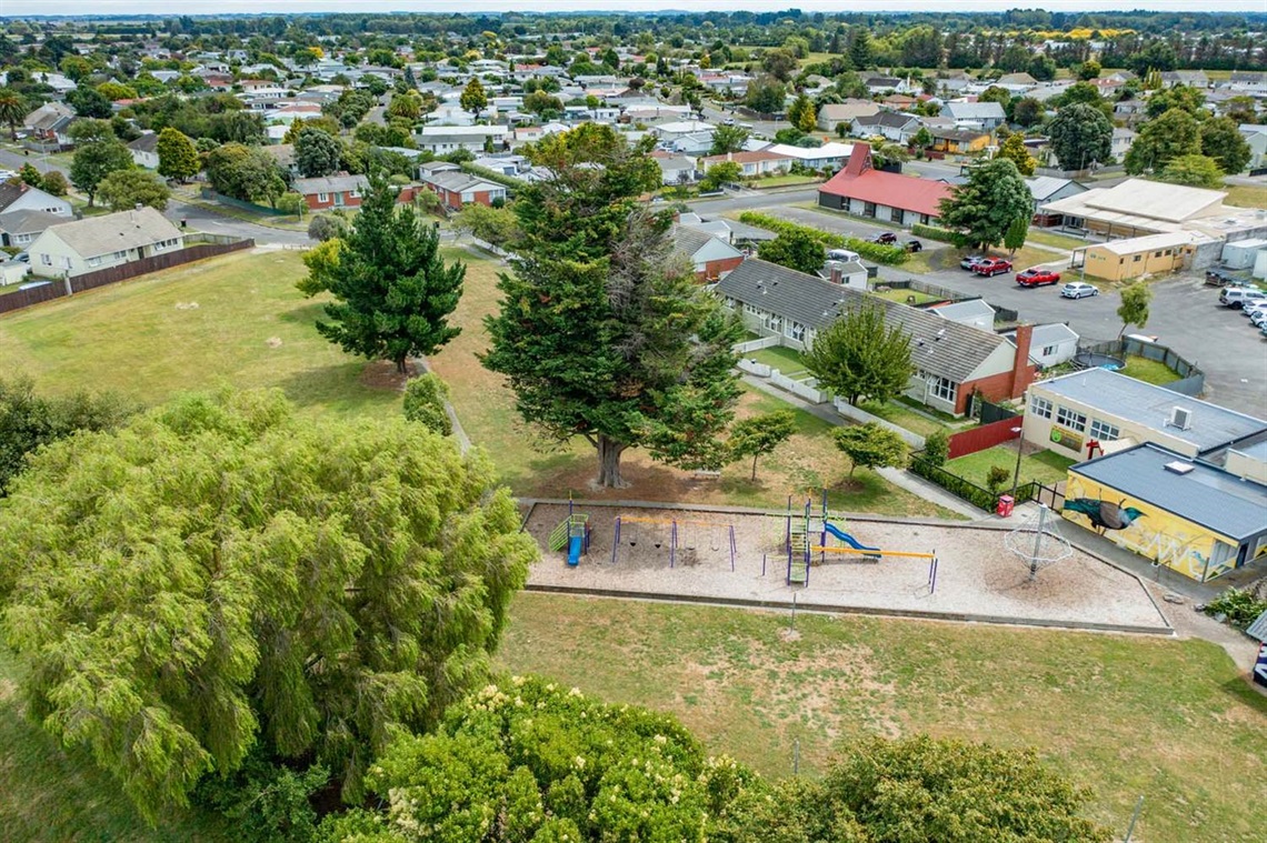 Image shows ariel view of play equipment in a park