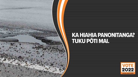 A pothole on road overlaid with text that reads: KA HIAHIA PANONITANGA? TUKU PŌTI MAI.