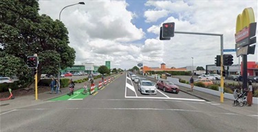 Cycleway on south side of the road, with bikers travelling in either direction