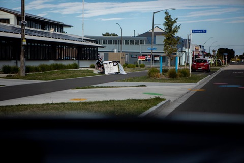 Image shows a homeless people on street