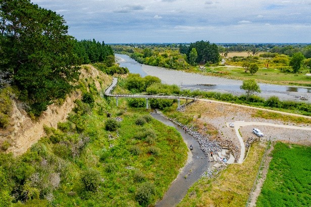 image shows aerial view of a low lying area along the river