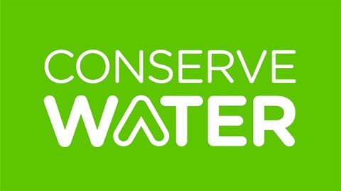 Green tile with white text that says conserve water.