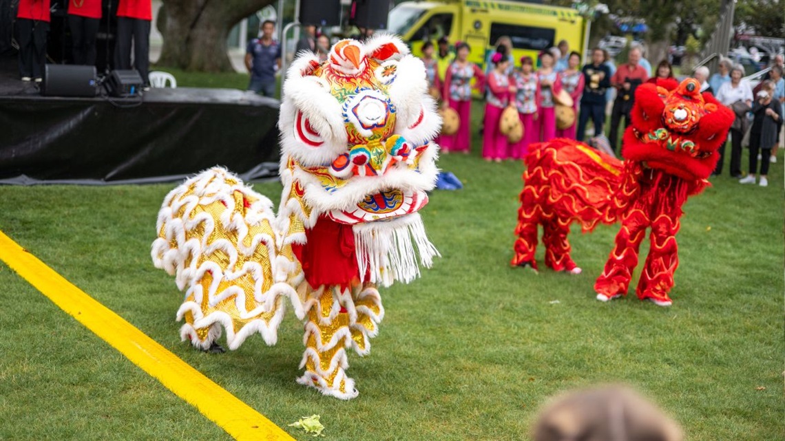Lion dancers performing at a Lunar New Year celebration in Te Marae o Hine – The Square.