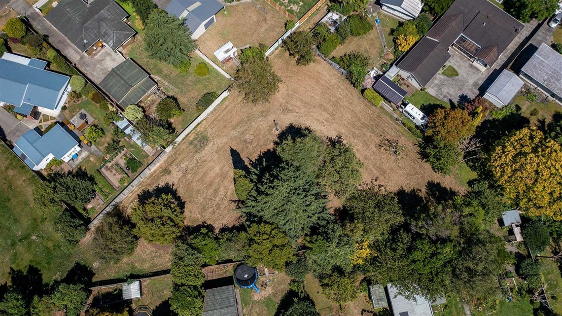 Aerial photo shows a triangle shaped play area.