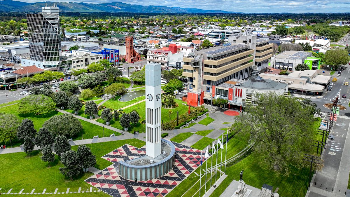 Palmerston North central city seen across the Square with the clock tower in the foreground.