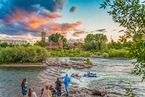 People whitewater rafting on Missoula's river.