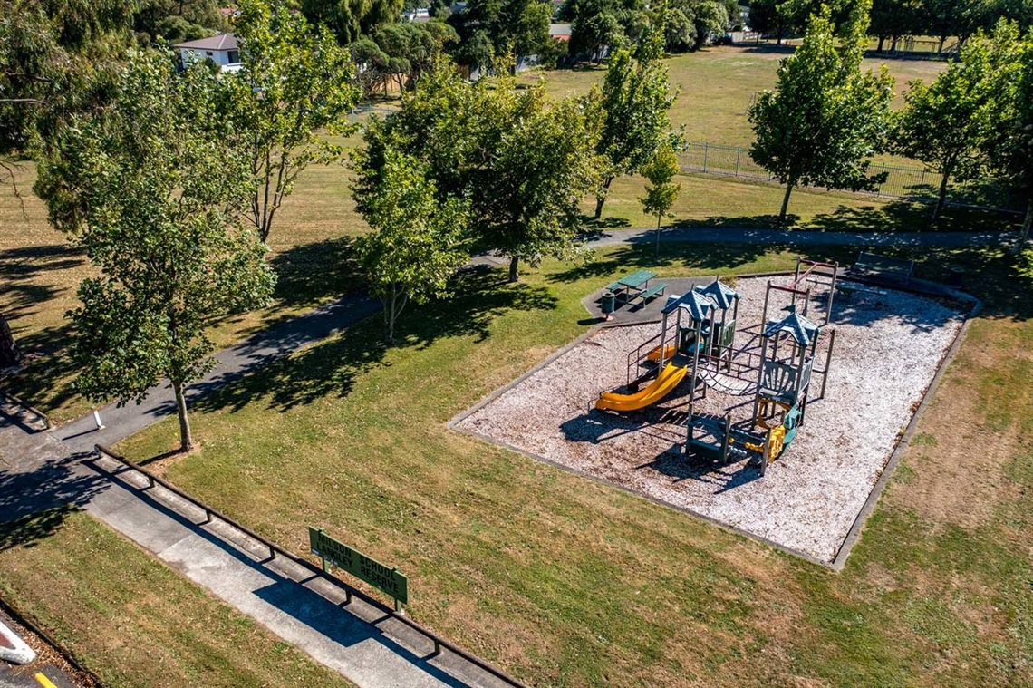 Image shows ariel view of play equipment in a park