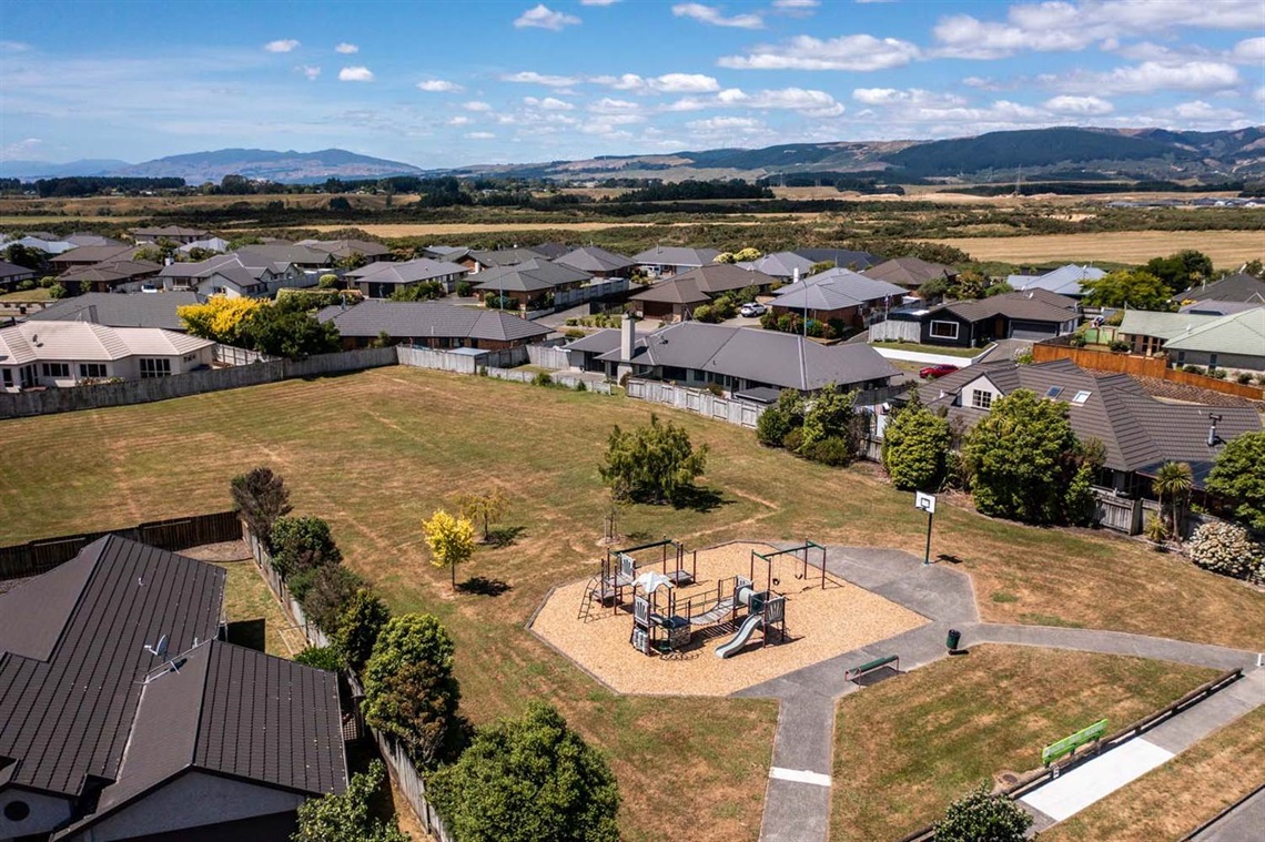 Image shows ariel view of play and netball equipment in a park