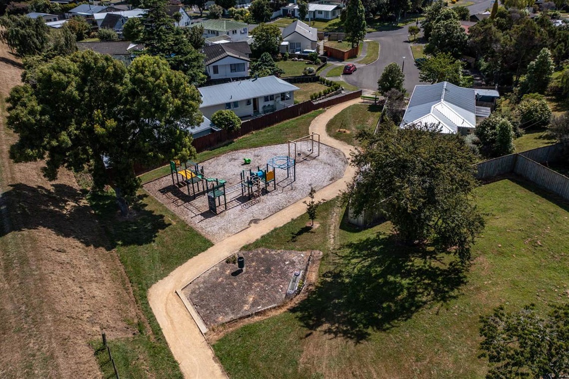 Image shows ariel view of play equipment in a park