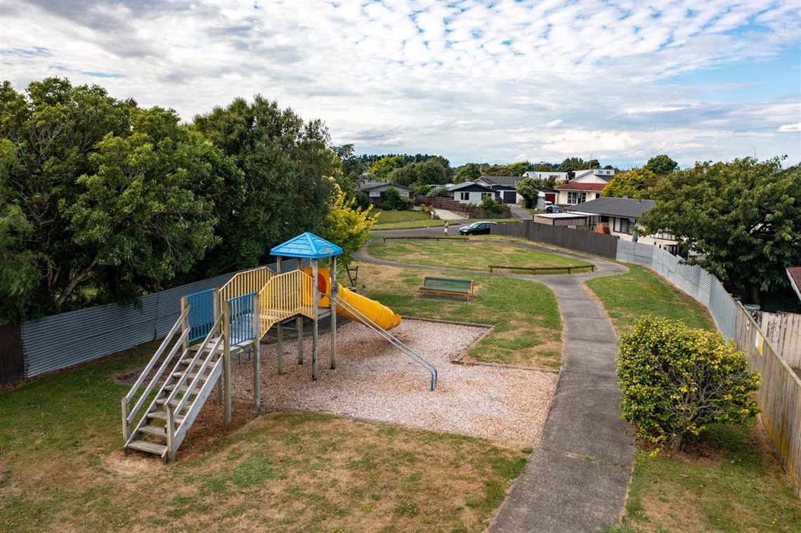 Image shows ariel view of play equipment in a park