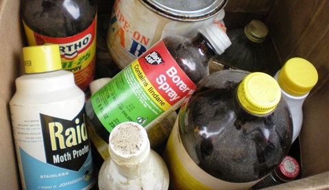 Photo shows box of common household chemicals, like pesticides and weedkiller.