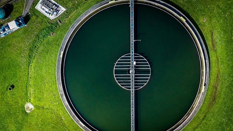 Drone footage of outdoor treatment pond.