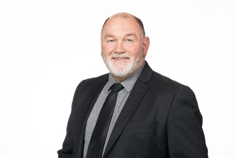 Head and shoulders photo of councillor Billy Meehan.