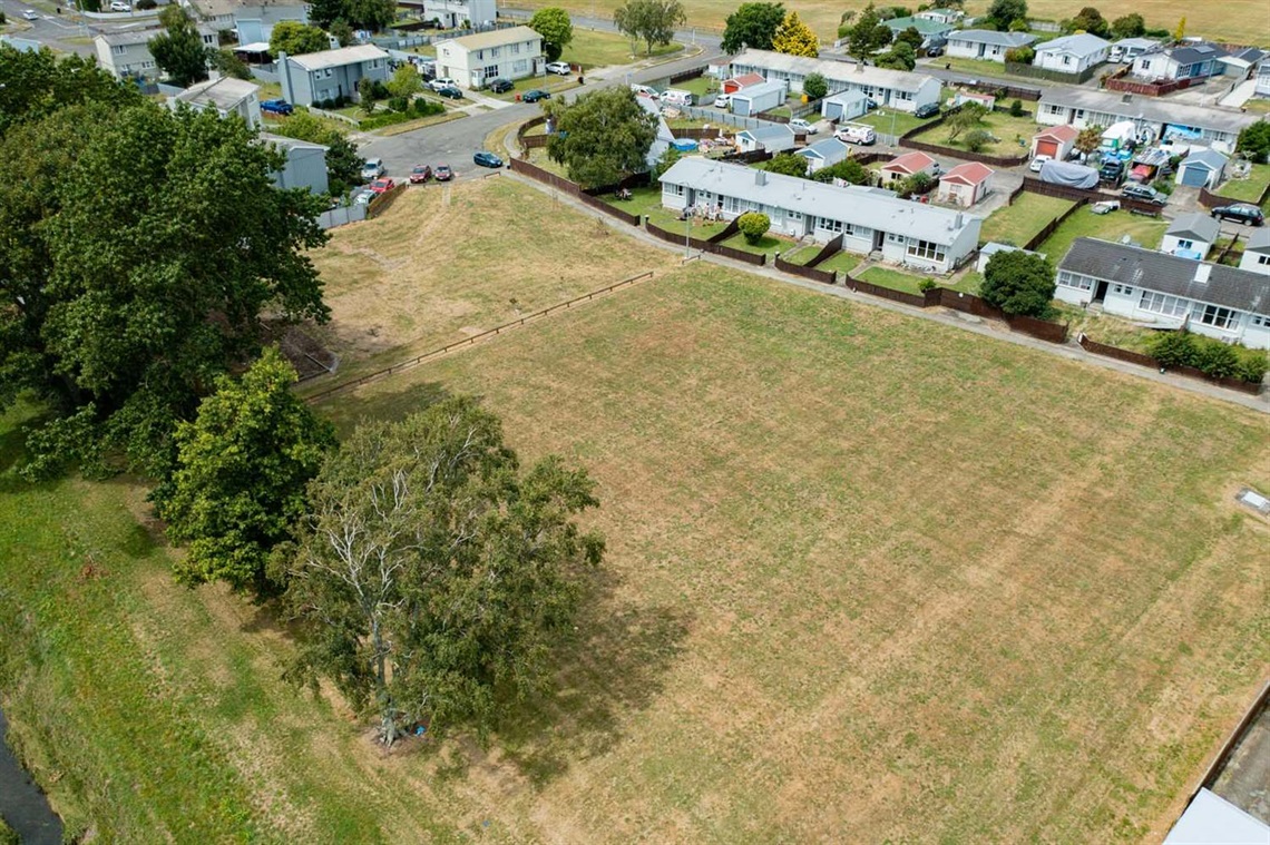 Image shows ariel view of grassfield,