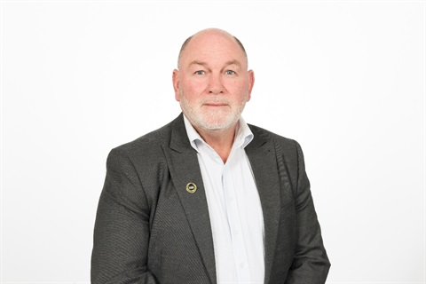 Head and shoulders photo of councillor Billy Meehan.